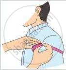The technique for using a flexible measuring tape to find a person's mid-upper arm circumference.